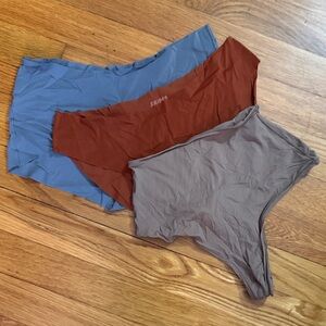 SKIMS - 3-Pack Seamless Thong Panties - Blue, Rust, Taupe